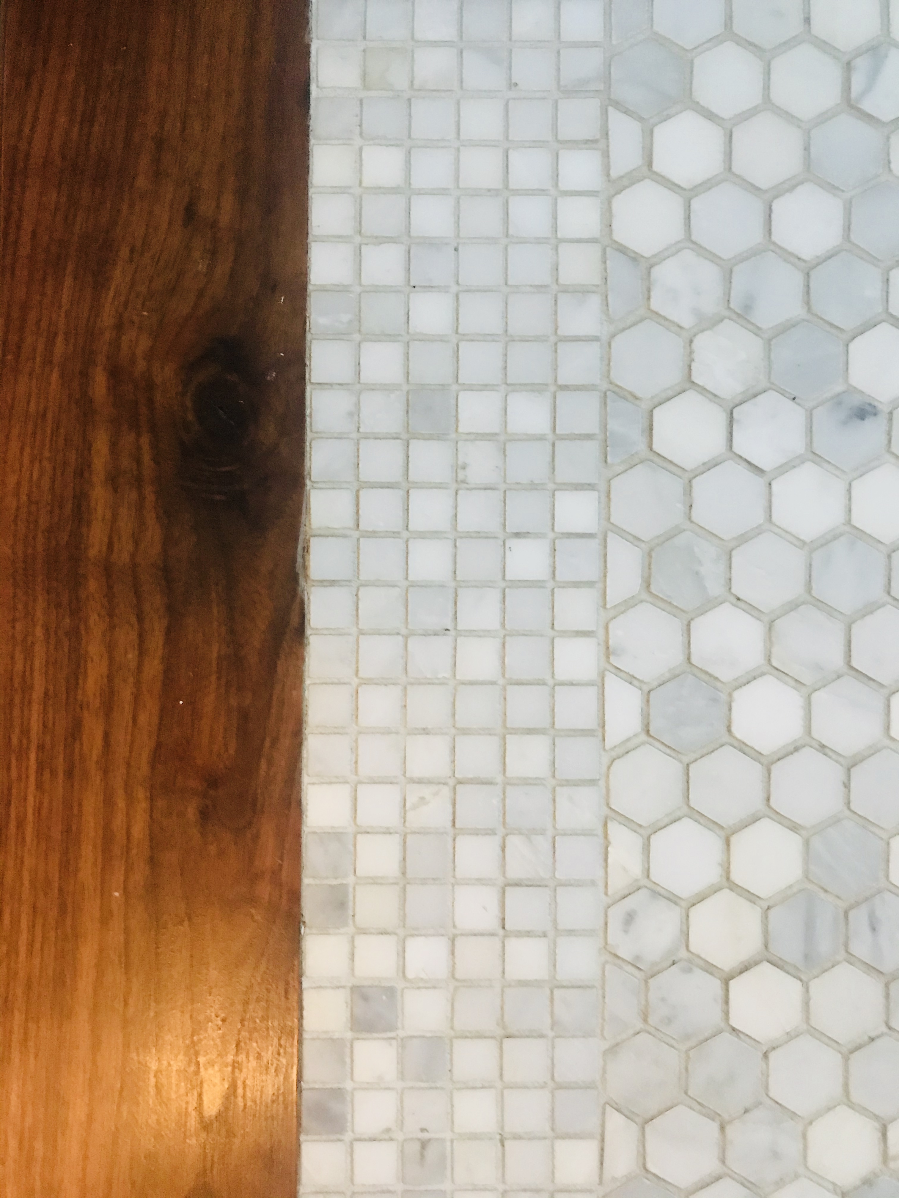 Floor tile and wood transition detail